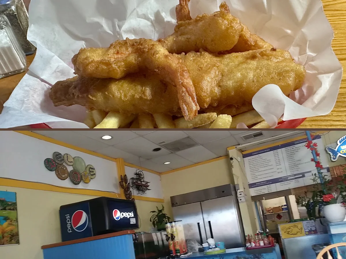 Golden fried fish and chips on a white plate.